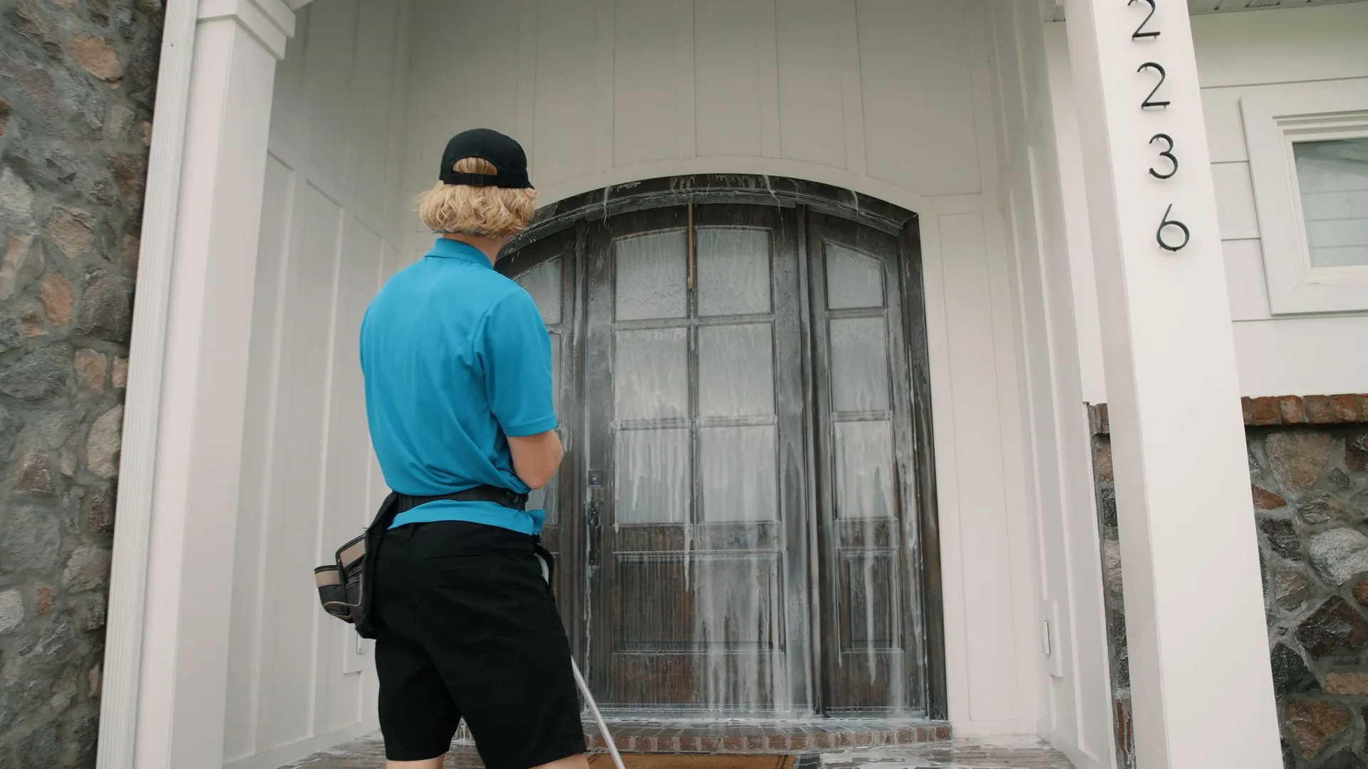 Soft washing a front entry door in Draper